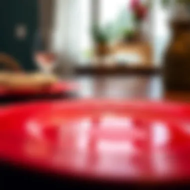 Close-up of a red charger plate highlighting its intricate design