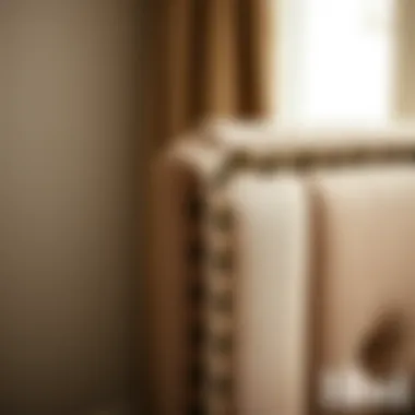 Close-up of intricate stitching on a tall twin upholstered headboard