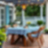 Elegant outdoor setting featuring a blue check plastic tablecloth