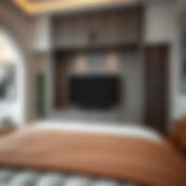 Elegant hidden TV cabinet design at the end of a bed