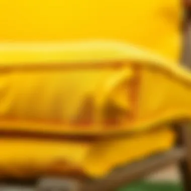 Close-up of high-quality fabric used for outdoor cushions in yellow hue