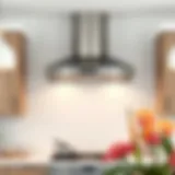 Sleek stainless steel over oven hood in a modern kitchen