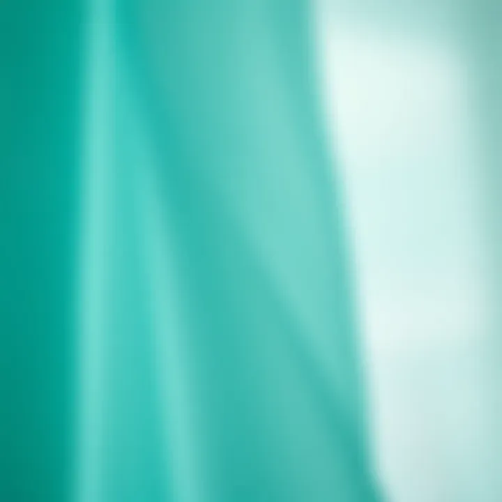 Close-up of teal sheer fabric showcasing texture and lightness