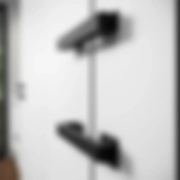 Sleek modern black drawer handles on a minimalist kitchen cabinet