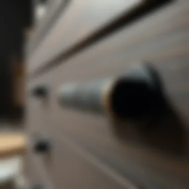Close-up of textured black drawer handles enhancing furniture aesthetics