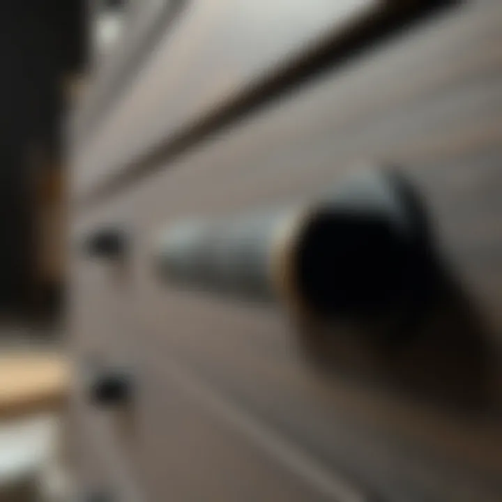 Close-up of textured black drawer handles enhancing furniture aesthetics
