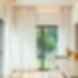 Elegant sheer curtains draping large windows in a modern kitchen