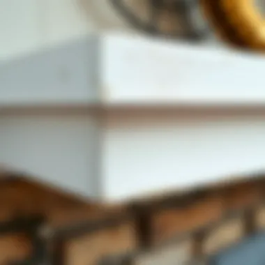 Close-up of the texture and finish of a white distressed mantel shelf